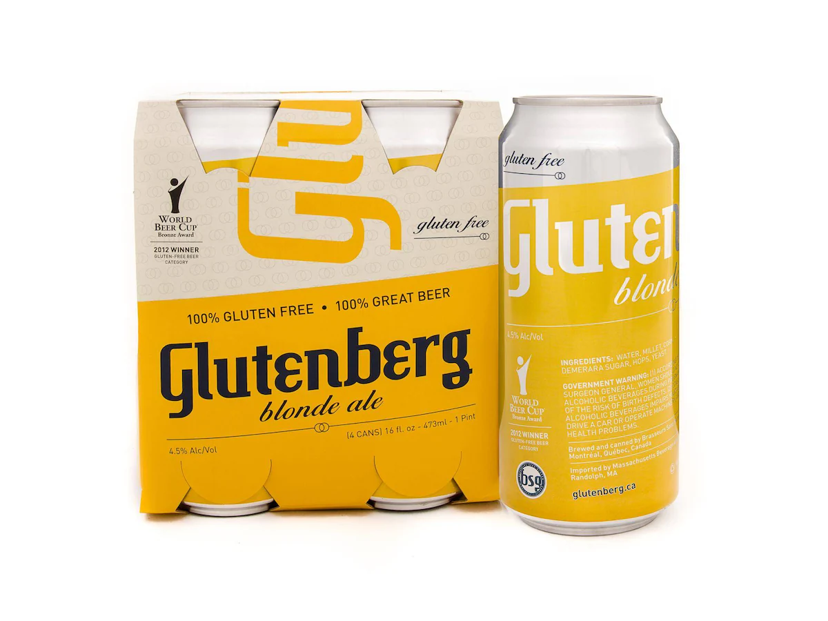 A bartender pouring a pale gluten-free beer from a can into a pint glass with foam rising at the top